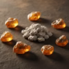 amber-incense-inspiration-4 The inspiration for Amber incense: a pile of the finished product surrounded by pieces of raw, golden amber resin glowing in warm light.