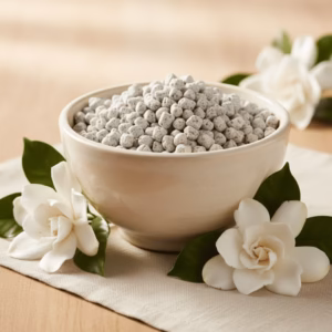 gardenia-athonite-incense-5 A white ceramic bowl of handcrafted Gardenia incense with fresh gardenia blossoms.