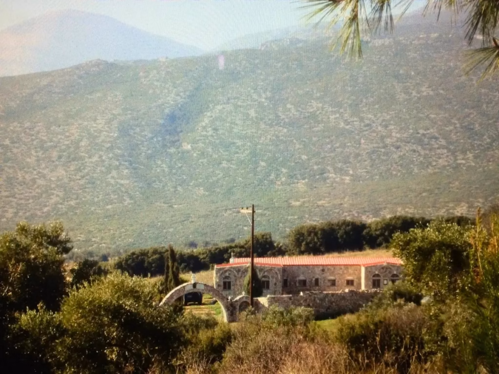 sacred monastery of st john of the ladder at the base of the mountain