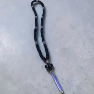 photo_2026-09-09_11-31-11 Black 100-knot satin komboksini with violet-pearl colored beads and a violet tassel.